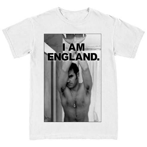 A white short-sleeve crewneck t-shirt featuring a large black-and-white graphic print on the front. The print shows a shirtless man with his arms raised, with bold black text reading 'I AM ENGLAND.