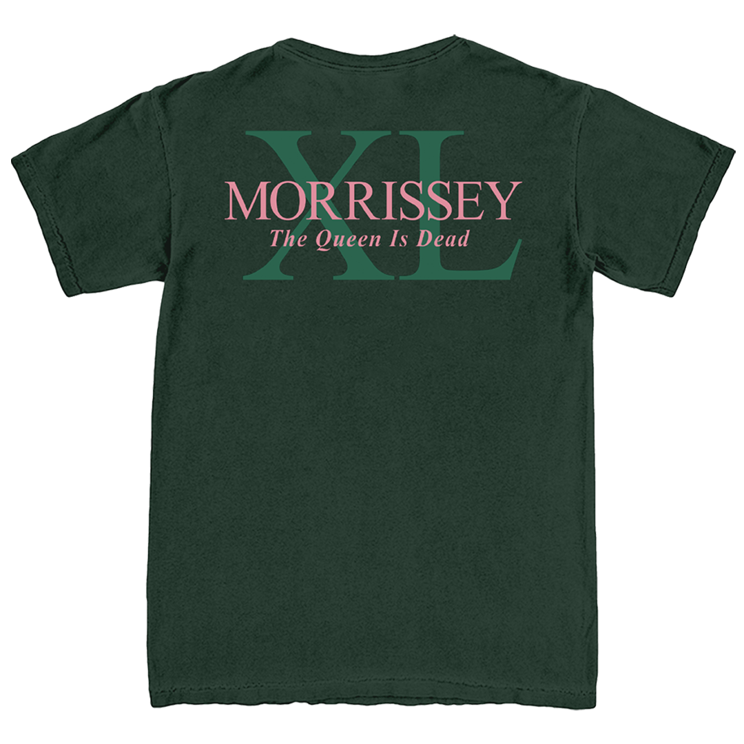 A dark green short-sleeve t-shirt shown from the back, featuring a graphic print with a large green 'XL' monogram, the word 'MORRISSEY' in pink, and the phrase 'The Queen Is Dead' in white script.